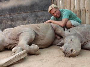 Braam Malherbe and baby rhino